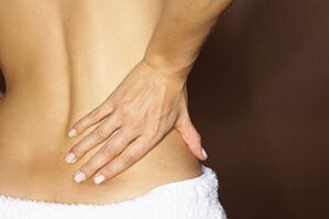 symptôme de douleur au bas du dos de l'ostéochondrose